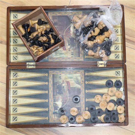 Two turned wood chess sets, a folding chess set board and pieces
